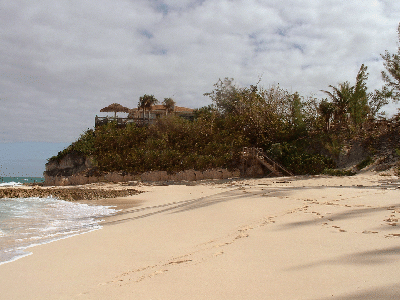 View of Sunrise Villa from beach, Tiki on the deck