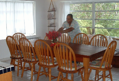 Solid cherry dining room table seats ten